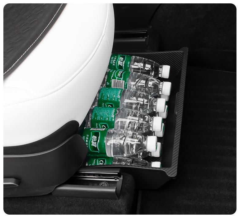 Versteckte Schubladen-Aufbewahrungsbox unter dem Sitz des Tesla Model Y