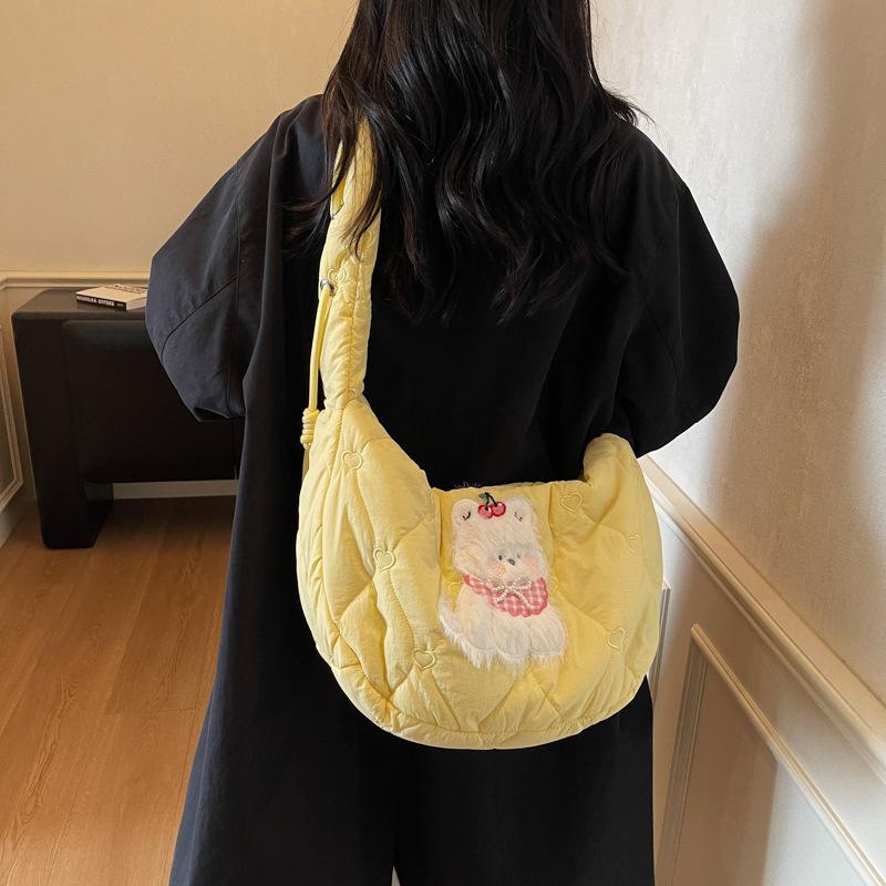 Large capacity cartoon shoulder bag women's 2025 autumn and winter new cute bear messenger bag commuter cotton clothes down bag