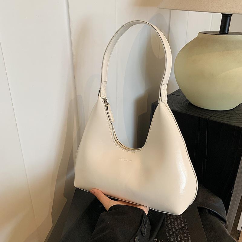 

Нишевая сумка подмышку женская, с высоким чувством стиля, ретро, универсальная сумка для поездок на работу, осенне-зимняя портативная сумка через плечо