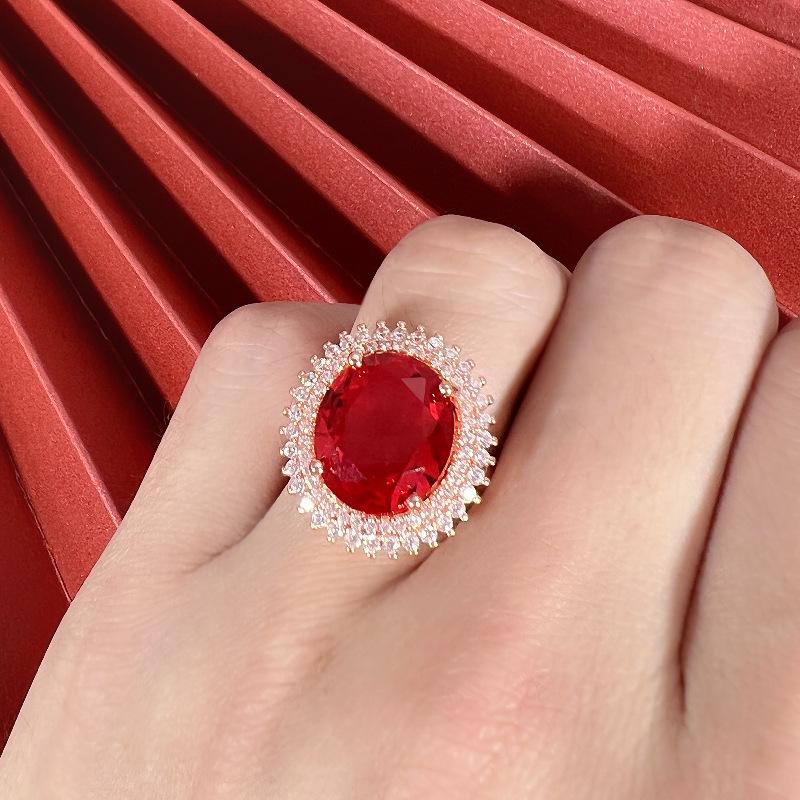 Pierścionek z różowego złota 18K z czerwonym turmalinem i cyrkonią diamentową