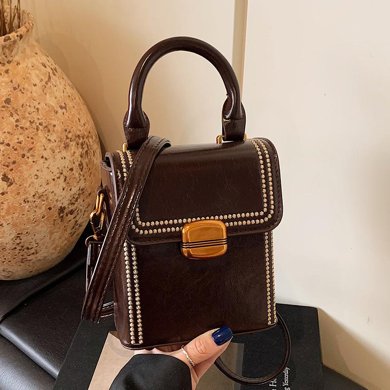Today's fashion, retro, high-end portable box bag, simple temperament, versatile commuter messenger women's bag