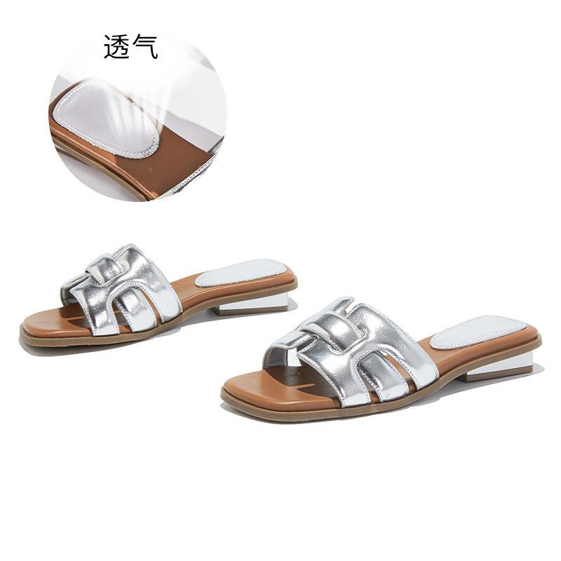 

Flat-bottomed slippers women wear high-end sandals when they go out in summer, casual and fashionable seaside with skirts and half-drags women 40 серебряный