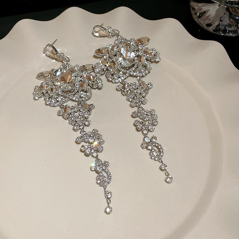 

Silver needle, water drop fringed earrings, European and American personality, light luxury temperament, earrings,advanced sense, versatile earrings
