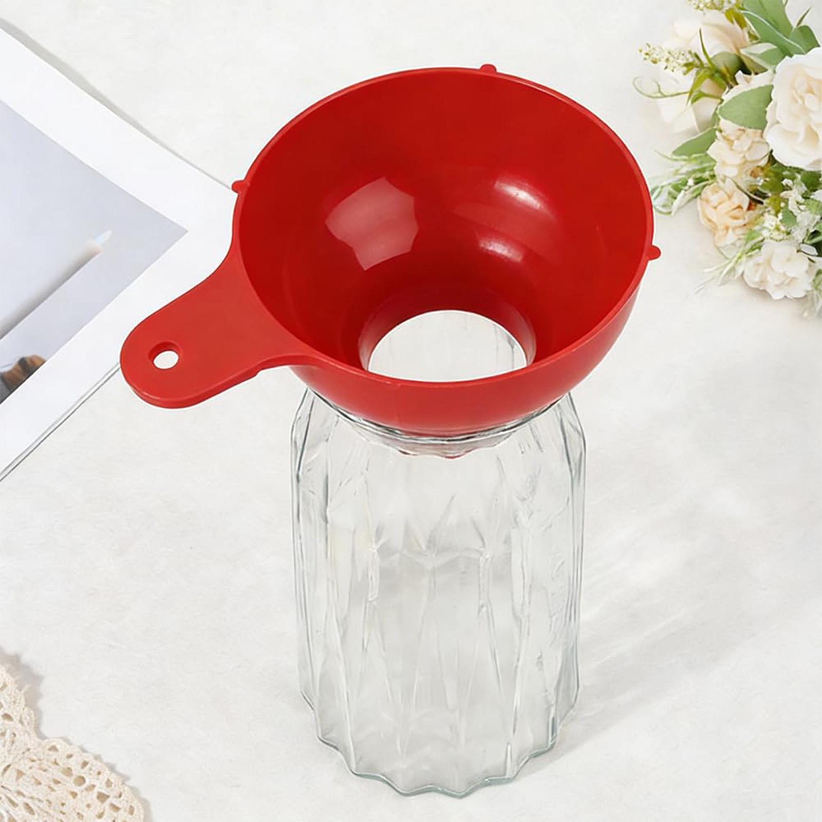 

Wide Mouth Plastic Funnel with Handle for Easy Pouring and Transfer of Liquids and Powders Suitable for Kitchen Garage and Workshop Use One Size