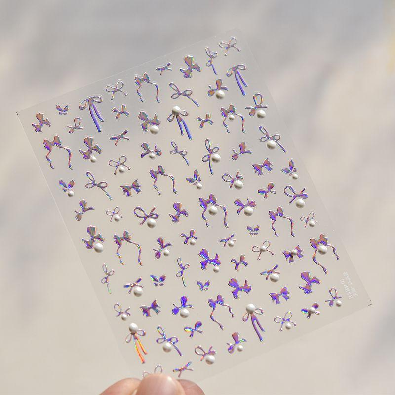 

Pearl Bows Nail Sticker New Year 5D Embossed Gold and Silver Powder Ribbon Ins Internet Celebrity Nail Sticker Decoration Laser Powder Bows 4818