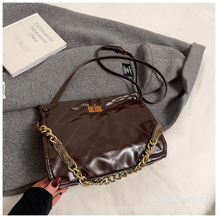 

Сумка-цепочка ромбовидной формы женская большой вместимости 2025 новая осенне-зимняя повседневная сумка-мессенджер ретро нишевая портативная сумка-тоут темно-коричневого