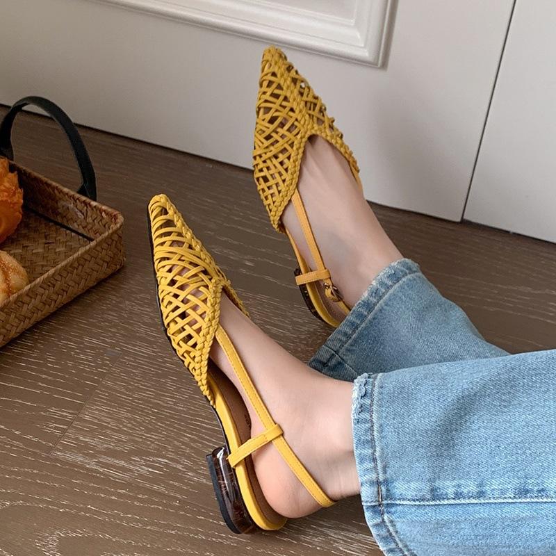 Sheepskin Korean version of niche leather woven breathable sandals women's summer flat bottom pointed hollow Muller outer wear cool slippers