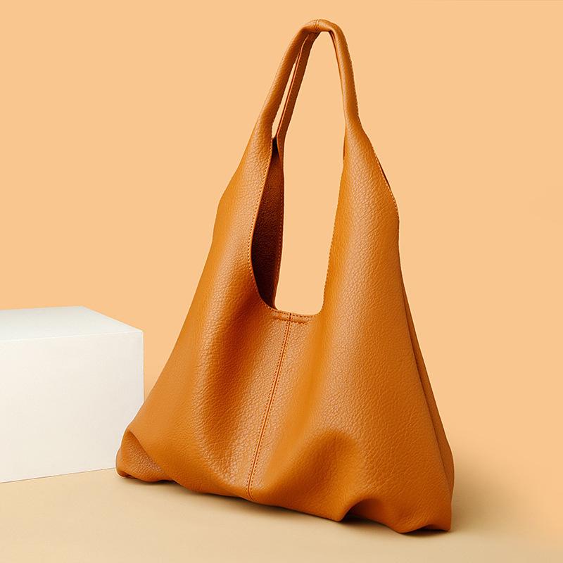 Sac fourre-tout portable mode pour les trajets quotidiens, style rétro européen et américain pour femmes, sac niche haut de gamme à bandoulière unique, sac d'aisselle texturé