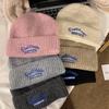Hat Women's New Warm Woolen Hat Korean Version Versatile Autumn and Winter Ear Protection Knitted Baotou Hat Shows Small Face