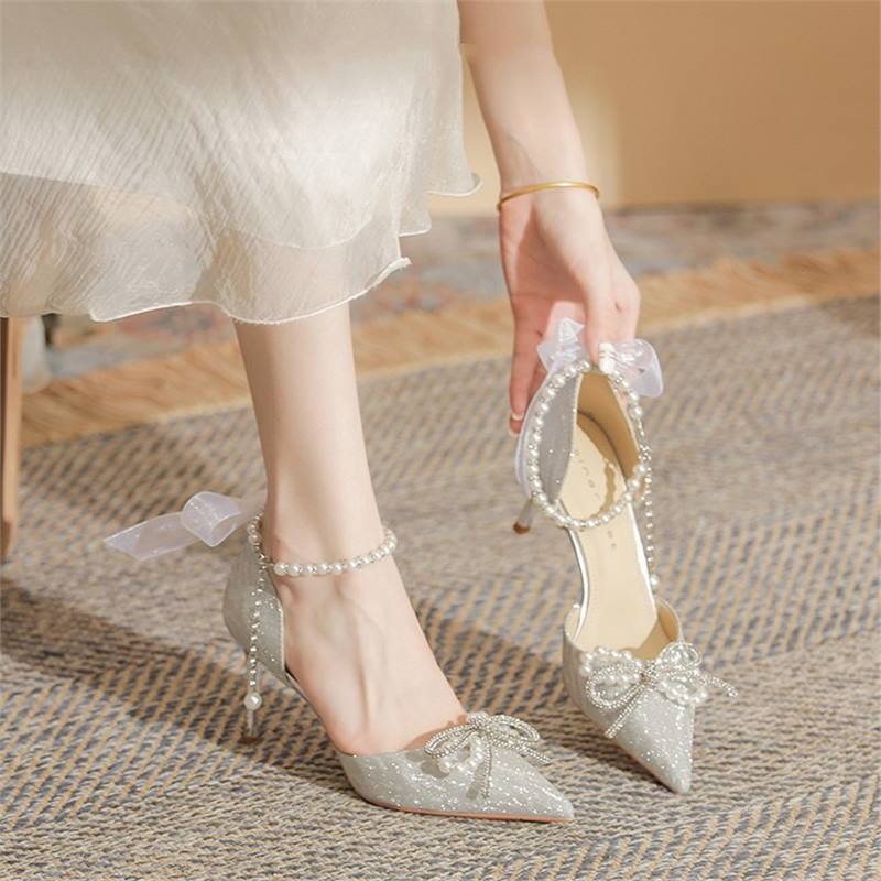 High heels women's 2025 summer new pointed head shallow mouth thin heel bow wedding shoes ribbon pearl chain hollow sandals