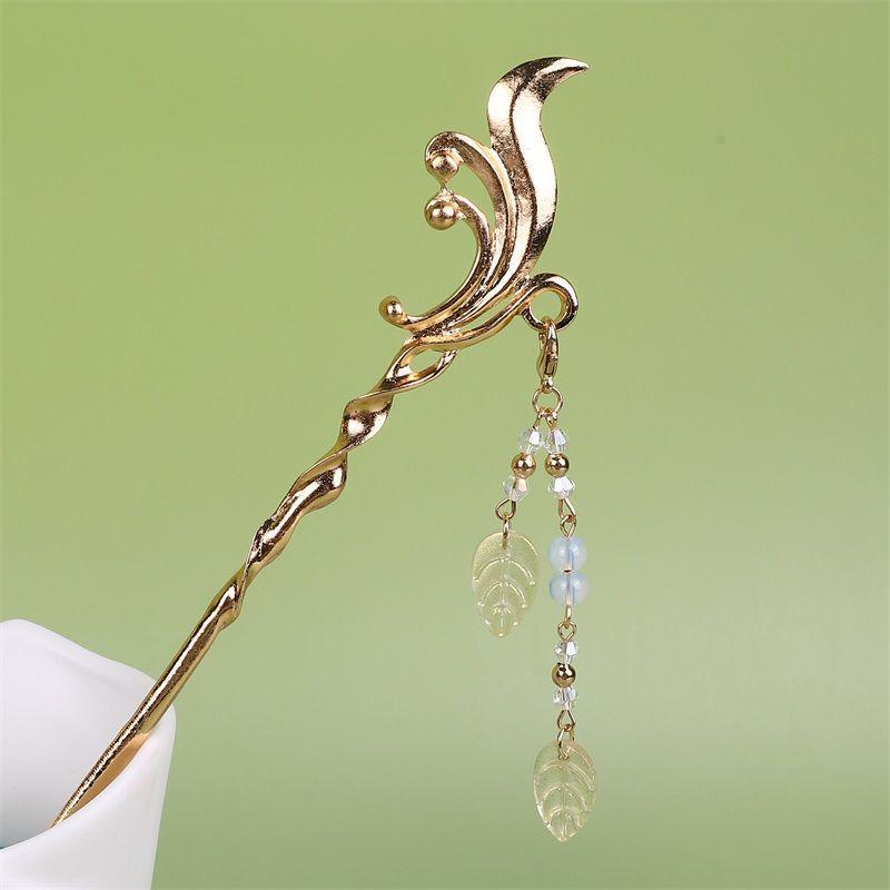 

Старинная перегородчатая заколка-кисточка – аксессуар в придворном стиле ханьфу