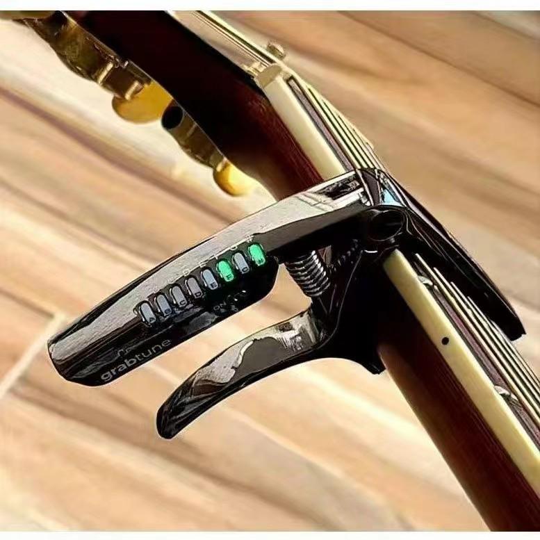 

Bai Ruike Rechargeable Guitar Tuner Capo - Creative & Personalized серебряный