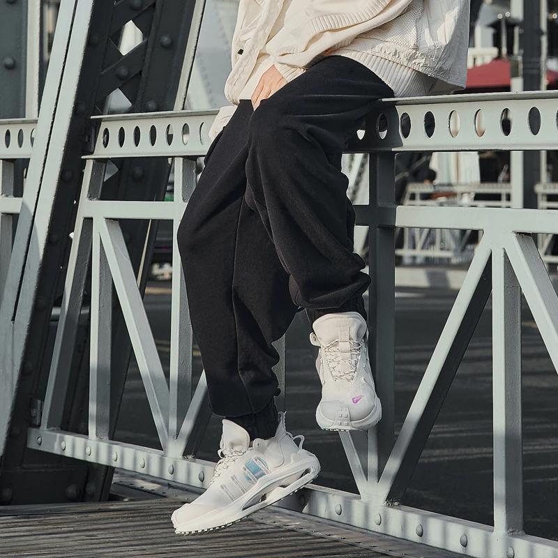Li Ning Sports Fashion Series Solid Color Zipper Pocket Design Elastic Waist Cuffed Casual Pants Men Bottoms Black AKLSF57-4