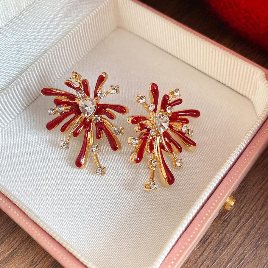 

Silver needle with diamonds, red fireworks stud earrings, New Year s atmosphere, temperament, versatile earrings, light luxury and high-end earrings.