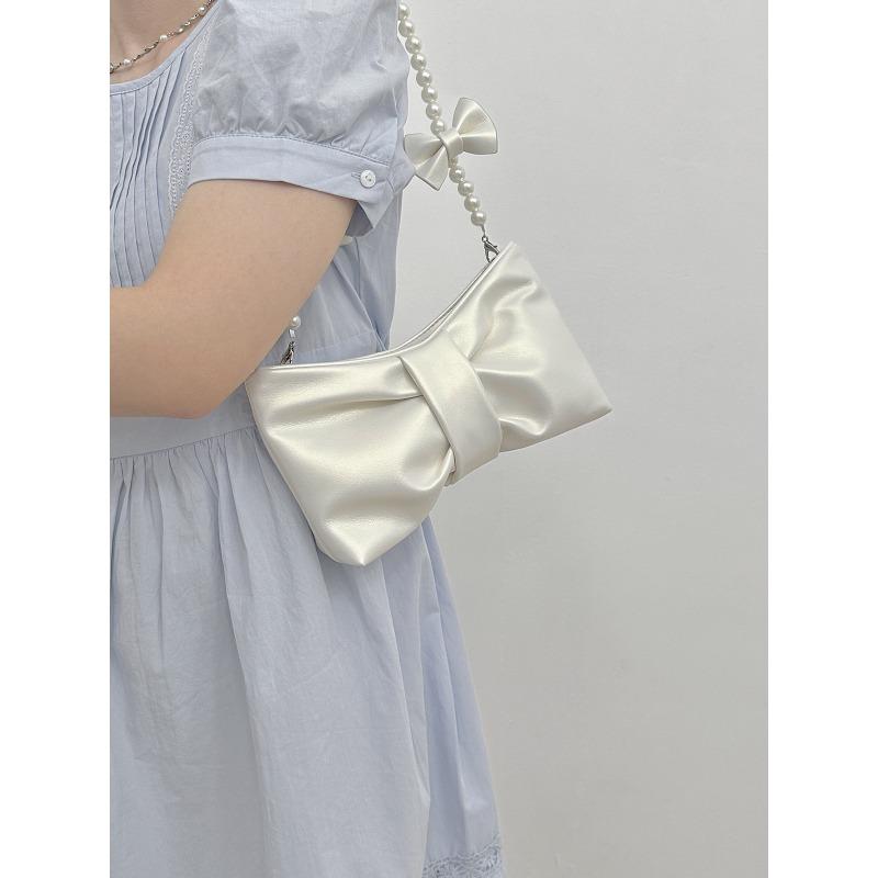 

Niche design single shoulder armpit bag new bow fashion texture messenger bag is now popular bag women жемчужина белый
