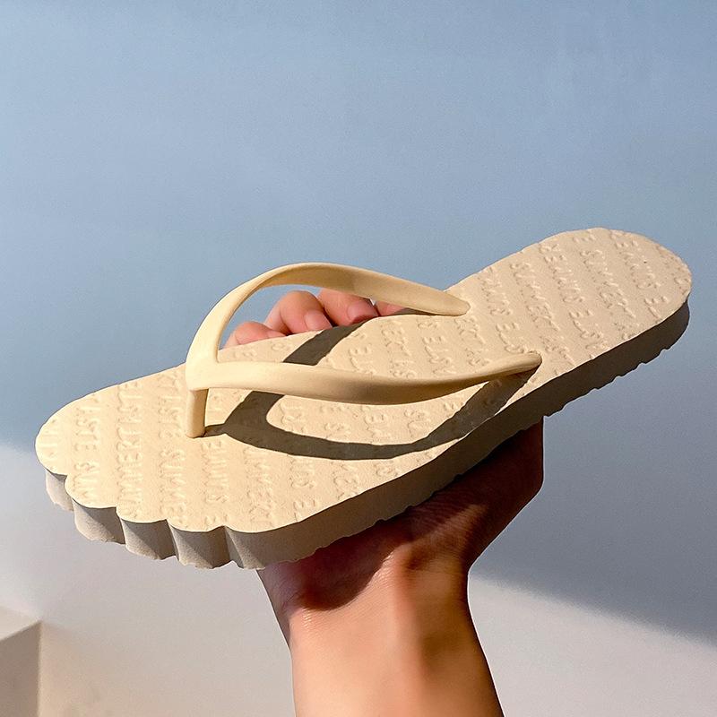 Flip-flops women's summer new non-slip outdoor wear solid color pinched feet seaside beach couple men's cool slippers