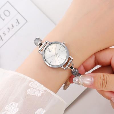 Modischer Trend schlichte Luxus runde Platte Zeigerstil Armband Damenuhr