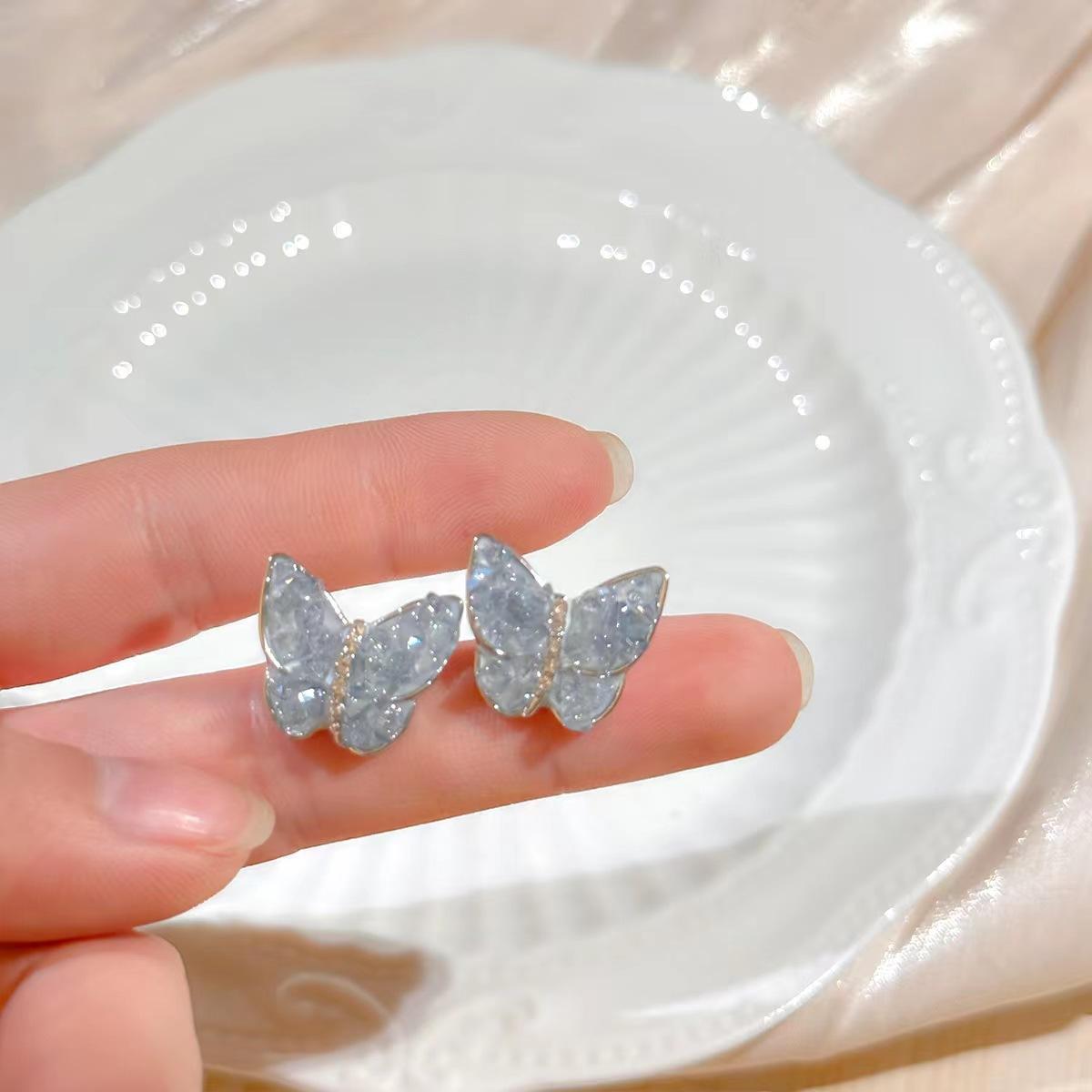 

111 silver needle super blue gradual change crystal butterfly stud earrings female versatile high sense earrings light luxury temperament earrings 925 silver needle