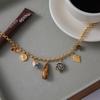 Youthway Resin Tiger Eye Stone Ceramic Flower Portrait Coin Pendant Necklace For Women 18K Gold Plated Stainless Steel Necklace