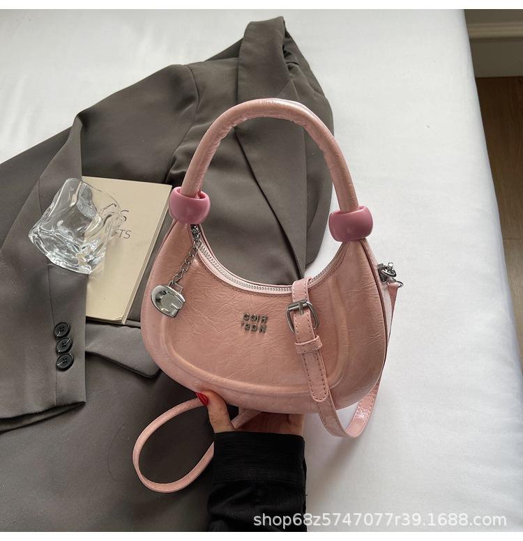 

High-end handbag 2025 new fashionable Korean crescent bag versatile one-shoulder crossbody bag commuter bag розовый