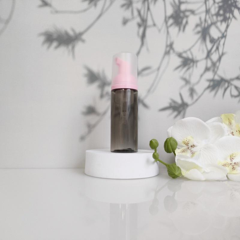 Available 60ml Transparent Black Foam Mousse Bottle for Face Wash and Travel-friendly Cosmetic Packaging.