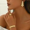 Four-Piece Gold-Plated Floral Jewelry Set: Bracelet, Ring, and Earrings