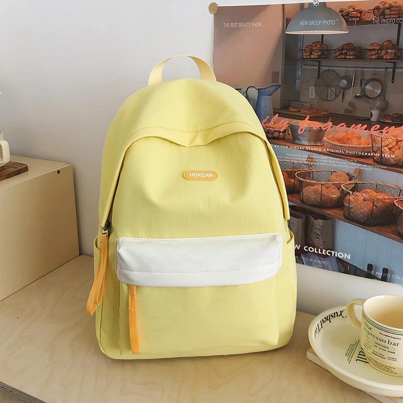 High value, fresh and sweet contrasting color backpack, light and multi-pocket backpack for primary and secondary school students
