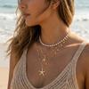 Exquisite Imitationsperlen-Seestern-Stapel-Halskette für Damen Böhmischer Meeres-Elemente-Anhänger Choker Sommer Strandparty Schmuck