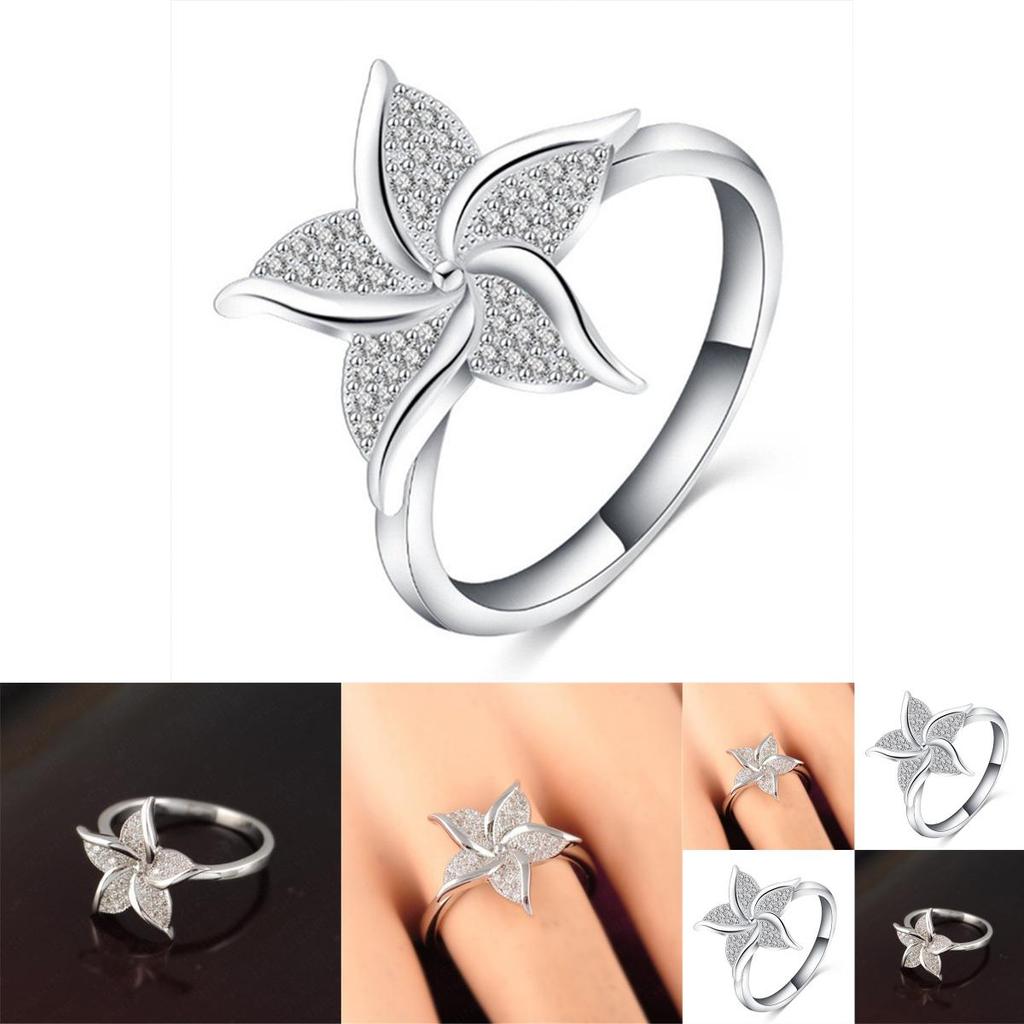 Stunning Fashion Windmill Shape Ring With Silver Plated Flower Design For Women