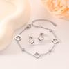 2 in 1 Titanium Steel Fashion Hollow Clover Flower Women's Bracelet Earrings Light Luxury Premium Zircon Set