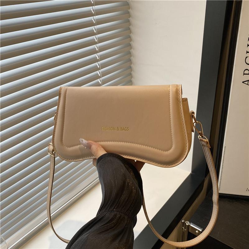 Textured hand-held underarm bag summer new fashion messenger bag solid color commuter retro shoulder bag women