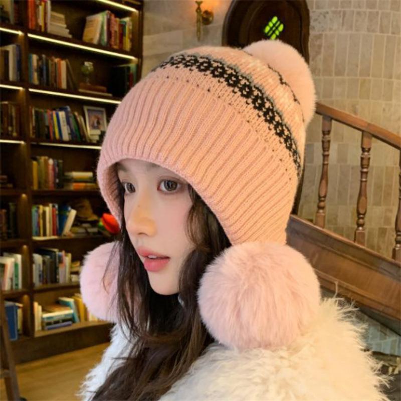Autumn and winter jacquard knitted hat girls sweet hairball pullover hat piled and thickened Fair Island cold-proof ear protection wool hat
