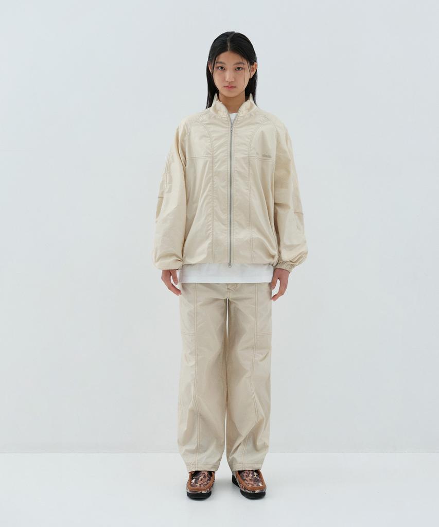 OIOI COLLECTION Layered Logo Glossy Coated Pants_Ivory
