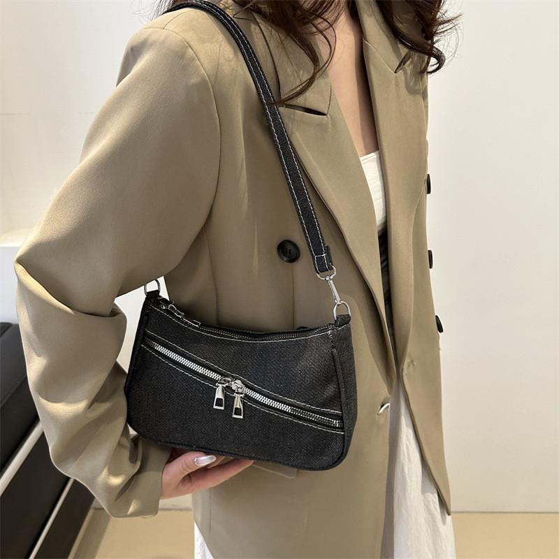 Neue Streetstyle-Umhängetasche aus Canvas für Damen (2024): Modisches Design mit schickem Achselbereich, trendig und vielseitig.