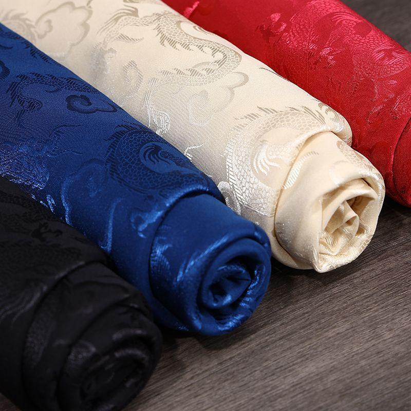High-end dragon-patterned jacquard satin fabric suitable for wedding dresses formal gowns and designer clothing fabrics