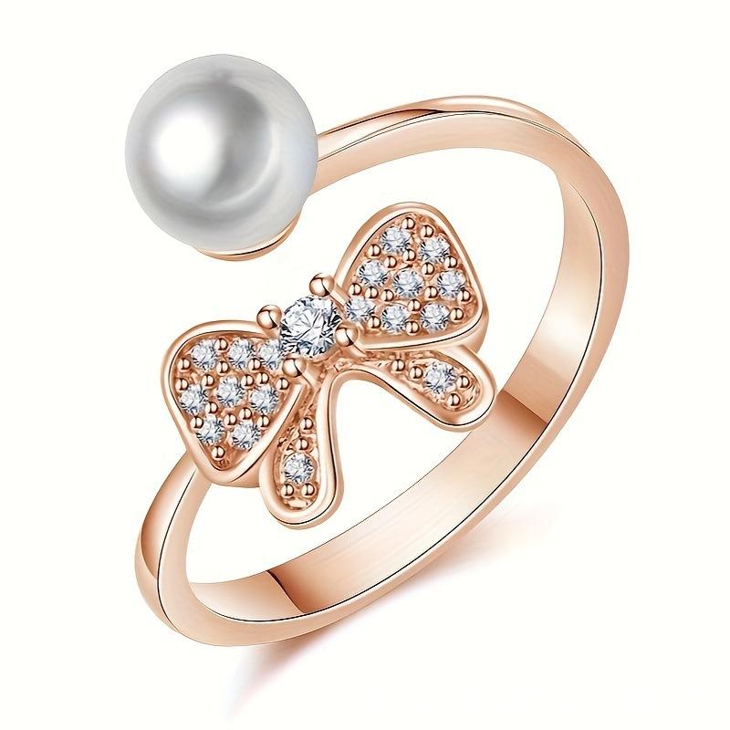Japanese and Korean version of the new simple personalized bow opening adjustable pearl ring women