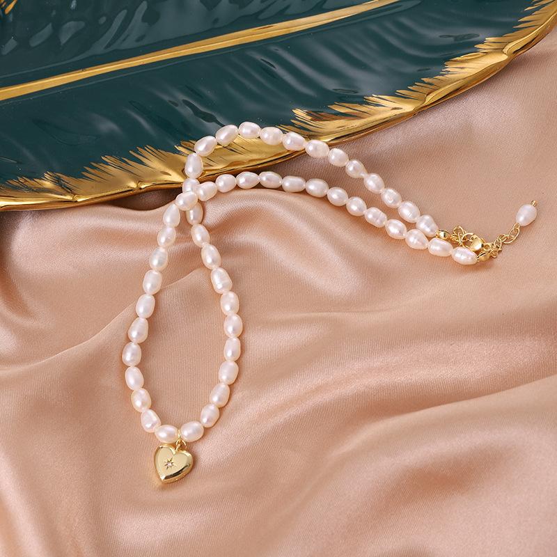 Natural freshwater pearl necklace, star heart pendant, pearl necklace, niche design, high-end sweater chain.