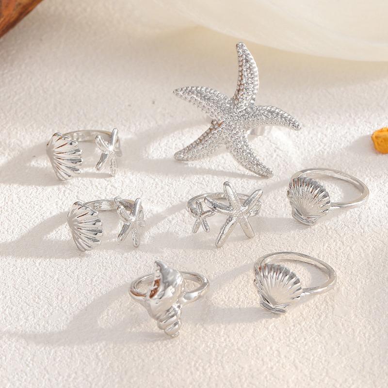 Ensemble de bagues, bijoux style océan, étoile de mer, bijoux articulation conque, bagues empilées irrégulières.