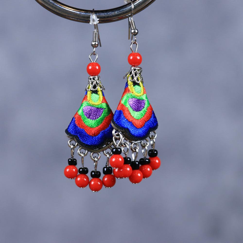 Chinese Retro Plum Blossom Fan Earrings: Women's Qipao Bell Tassel Pendants for Hanfu