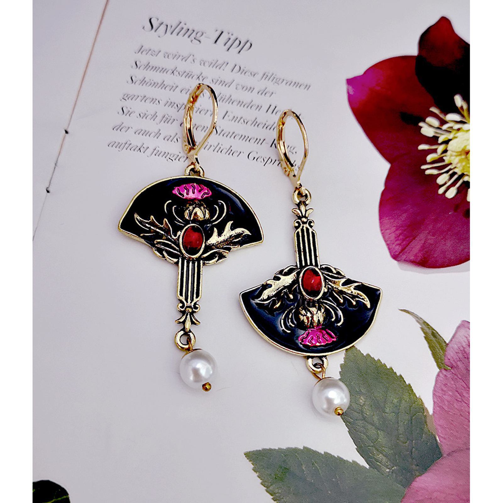 Новые креативные серьги-капли с цветком чертополоха — фото 3