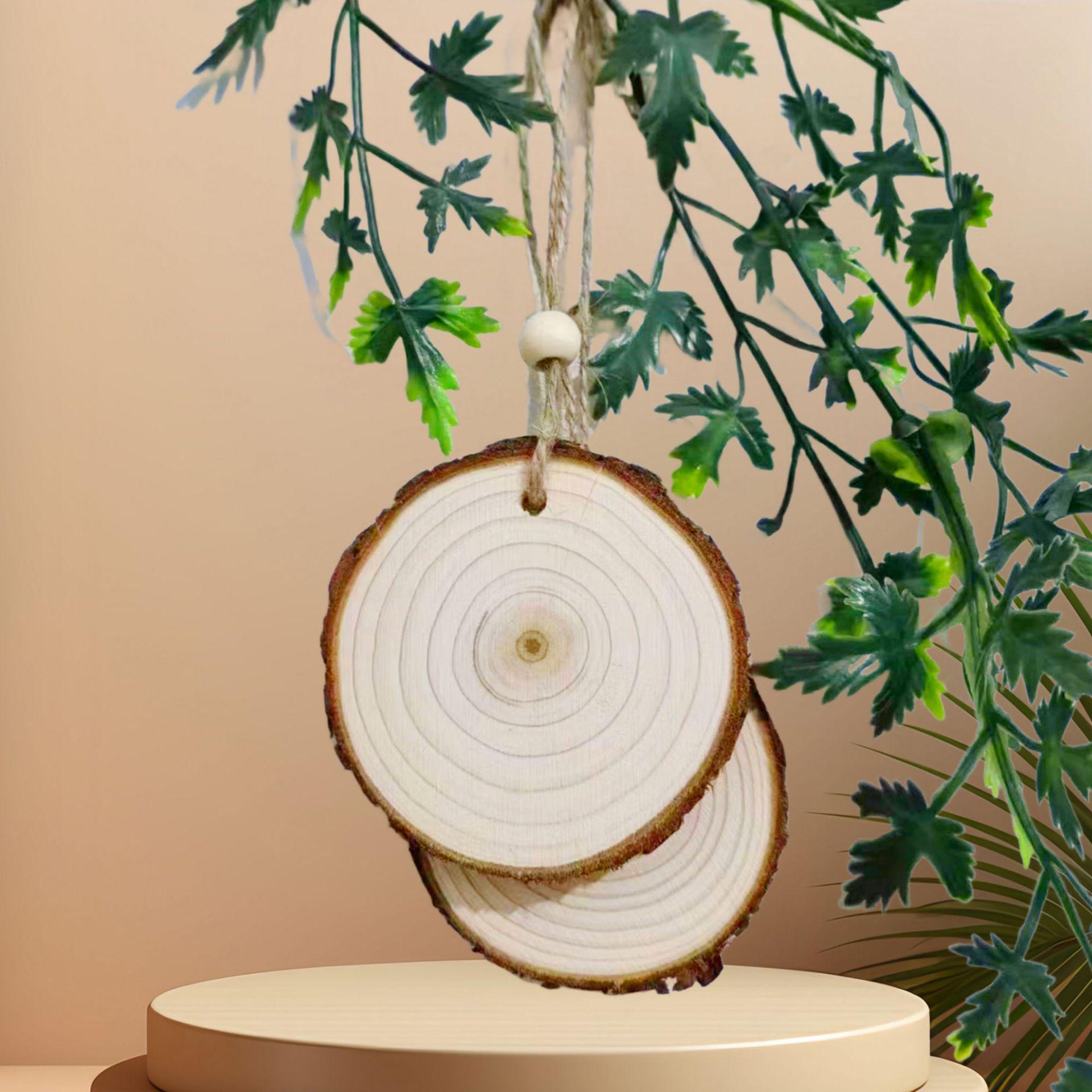 

DIY Pine Wood Tree Ring Slices: Ideal for Decorative Backgrounds and Handmade Projects Punched with Jute Rope and Beads