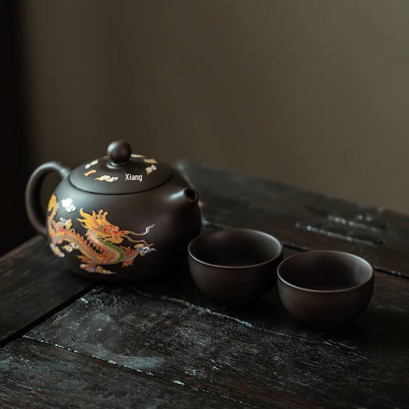 

Heat-Changing Dragon & Phoenix Zisha Teapot Set
