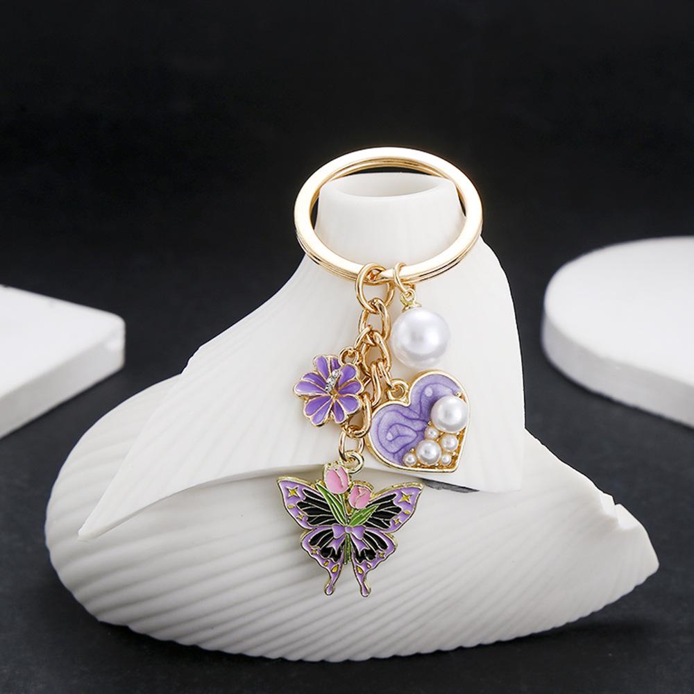 Purple Heart Pearl Butterfly Keychain with Simulated Tulip Flower