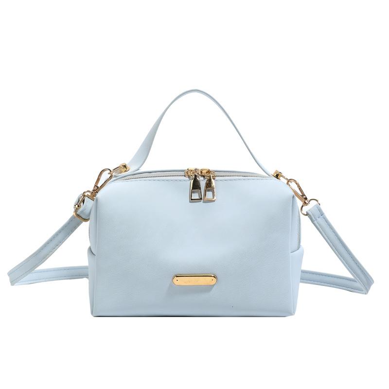 

Bag women s retro commuter solid color shoulder pillow bag new go out zipper shoulder simple messenger bag синій