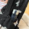 Butterfly Embroidery Backpack Casual Daily Bag Large Capacity School Bag for Students Commuters Minimalist Fashion Design with Tassel Details