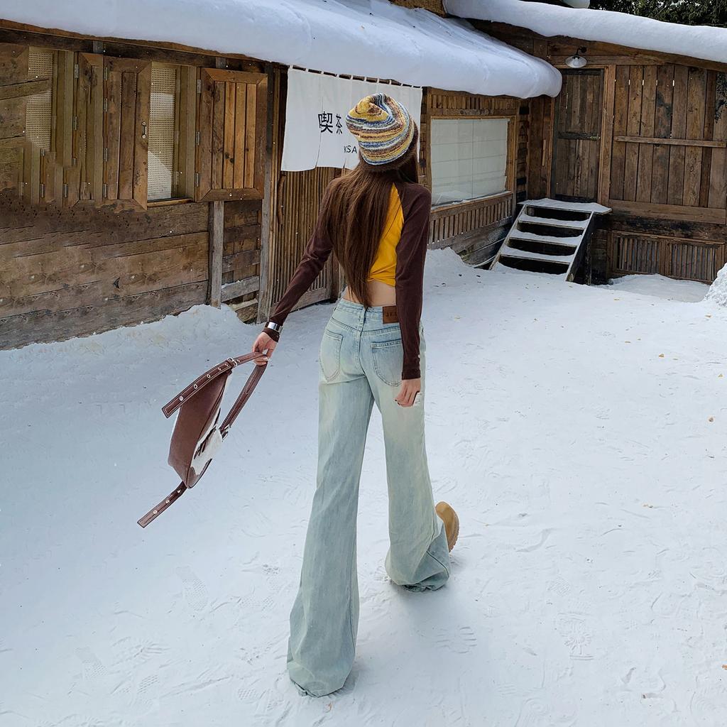 American retro light-colored low-waisted and slightly pulled jeans for women's autumn and winter new loose and thin flared pants without sticking