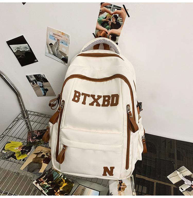 Large-capacity multi-layer schoolbag, junior high school students, girls, boys, high school students, load reduction ridge protection