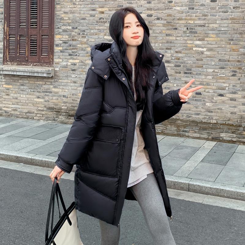 

Сохраняйте уют и стиль зимой с этим женским пуховиком средней длины с капюшоном в корейском стиле XXL чёрный