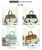 Borsa a tracolla da donna in tela platino e pelle patchwork