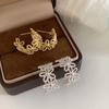 Korean version S sweet hollow flower stud earrings female design Internet celebrity earrings